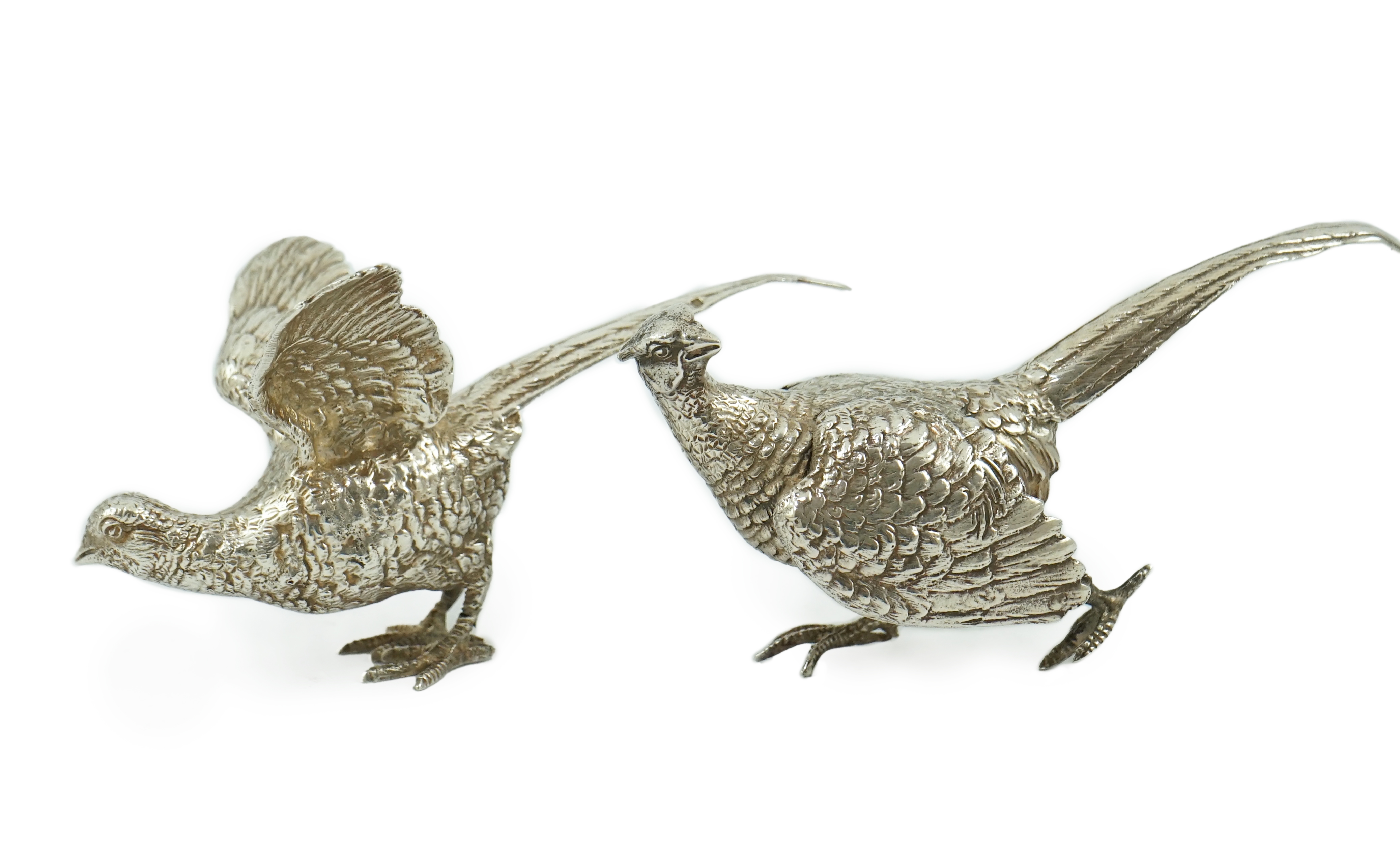 A pair of Elizabeth II silver free-standing model pheasants, by Edward Barnard & Sons Ltd